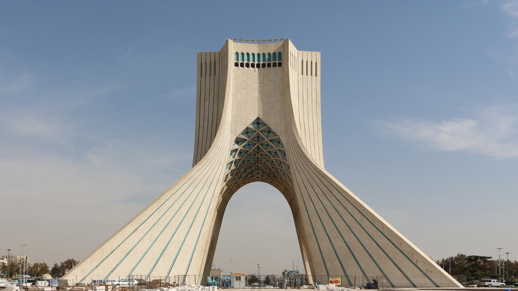The Azadi Tower in Tehran, Iran, seen against a clear blue sky