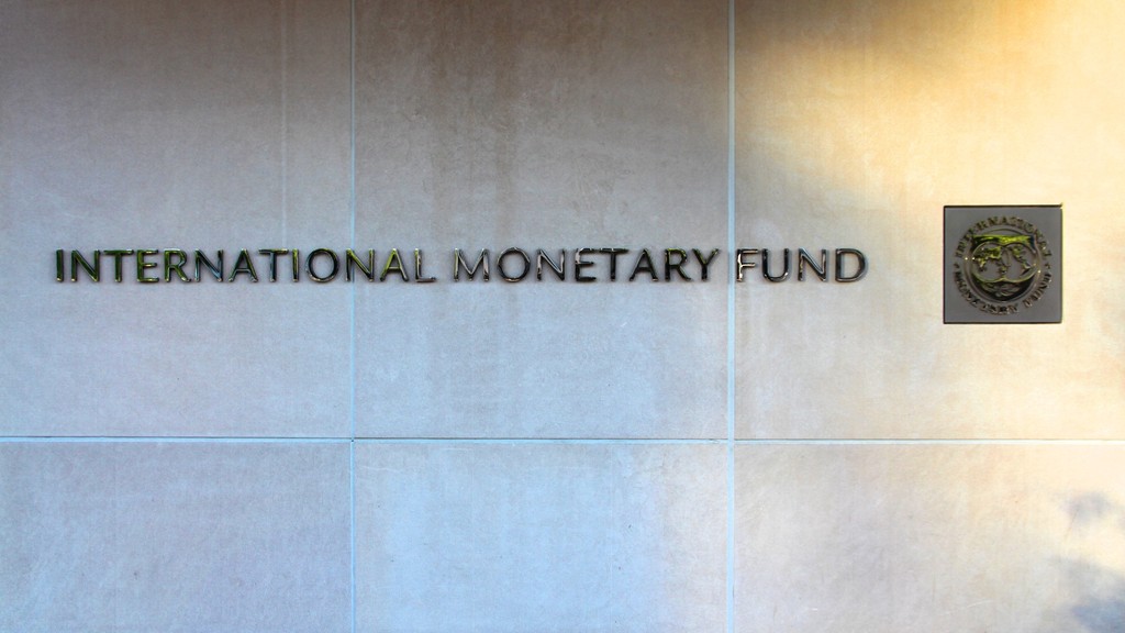 The International Monetary Fund headquarters sign and emblem on the building wall in Washington DC