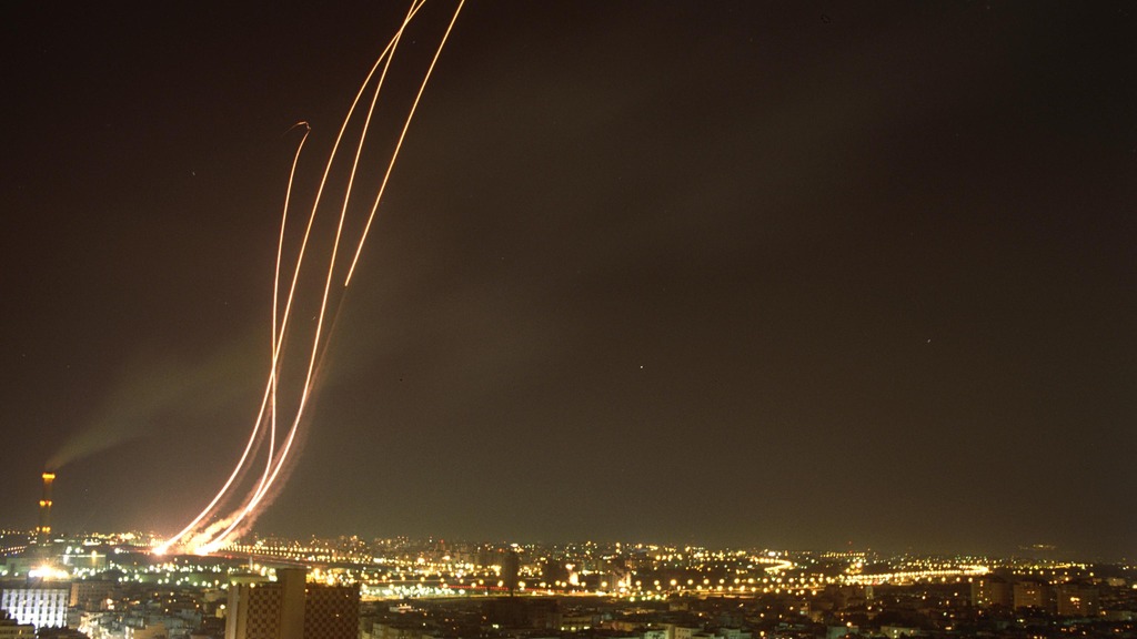 Patriot air-defence interceptor missiles launched toward an incoming ballistic missile at night (file photo)