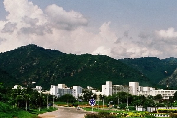 Pakistan Secretariat buildings in Islamabad below the Margalla Hills, as the APT digital transformation symposium opens in the capital