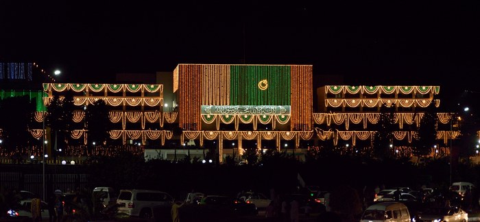 Parliament House in Islamabad illuminated at night, the seat of Pakistan's National Assembly and Senate