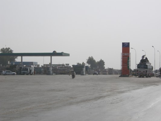 PSO petrol station in Hyderabad, Pakistan, with fuel pumps and vehicles on the forecourt