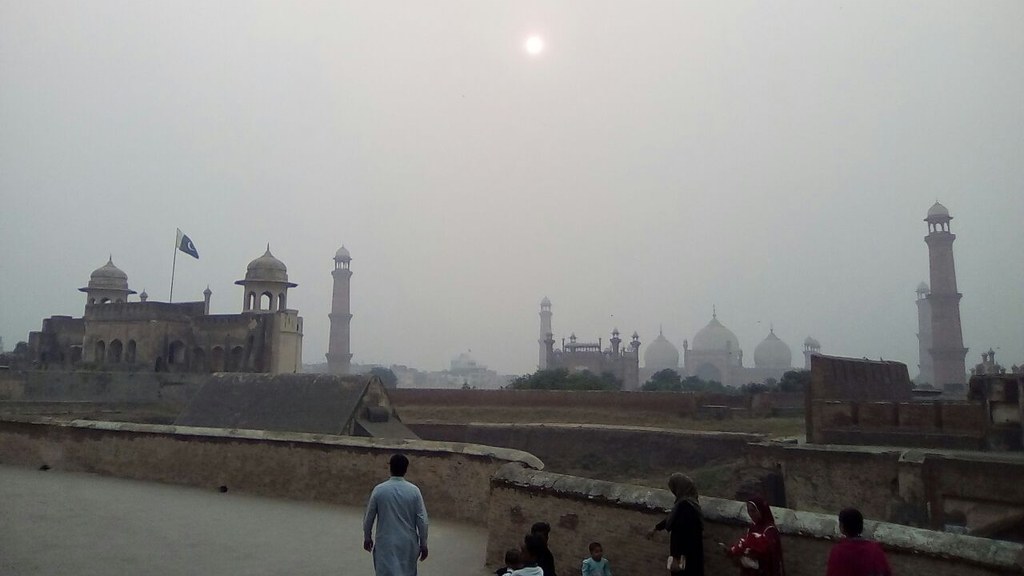 The Badshahi Mosque seen through thick haze from Lahore Fort — Lahore's average AQI reached 200 as Punjab widened its anti-smog operation across the province
