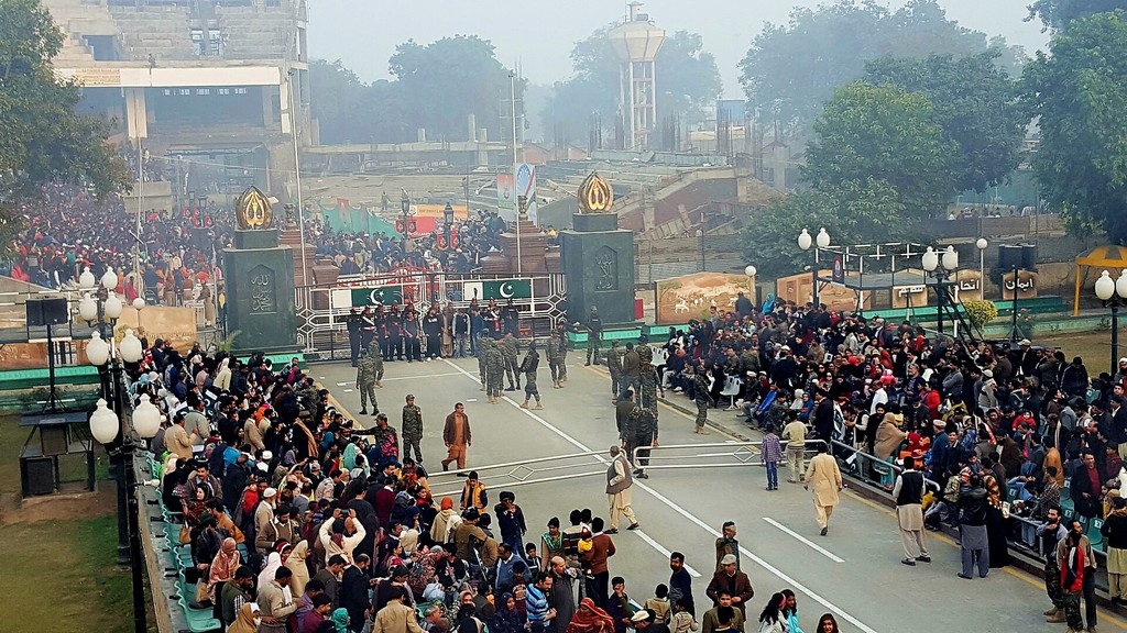 Crowds on the Pakistani side of the Wagah border ceremony ground with the Bab-e-Azadi gates, where Atif Aslam's Tajdar-e-Haram played over a Bollywood film promotion
