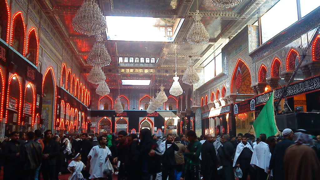 Pilgrims inside the courtyard of the Imam Husayn Shrine in Karbala, Iraq, shown in a file photograph.