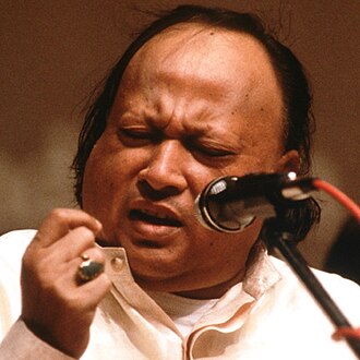 Ustad Nusrat Fateh Ali Khan performing qawwali, remembered on his 78th birth anniversary as the singer who took the Sufi tradition to the world