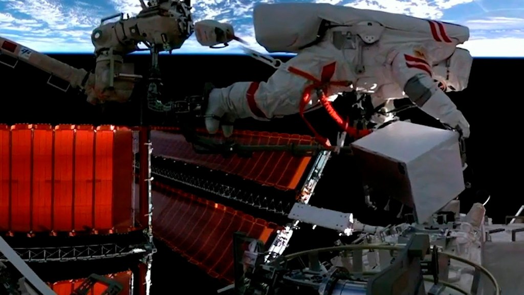 An astronaut on a spacewalk outside China's Tiangong space station, the station Pakistan's first astronaut is scheduled to visit on the November 25 mission
