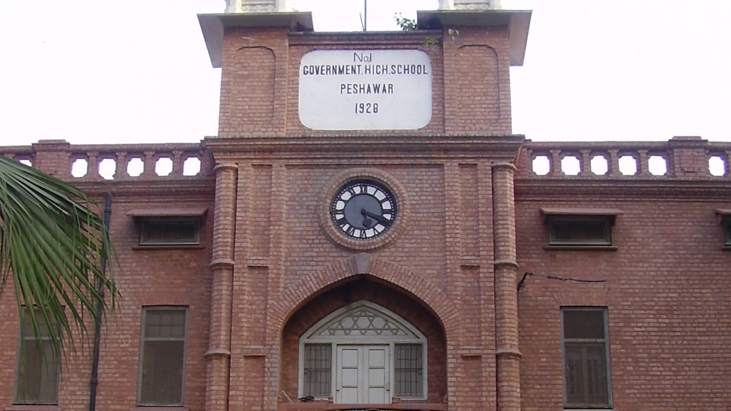 The red-brick facade and clock tower of No.1 Government High School Peshawar, built in 1928, as Khyber Pakhtunkhwa orders safety inspections of school buildings across the province