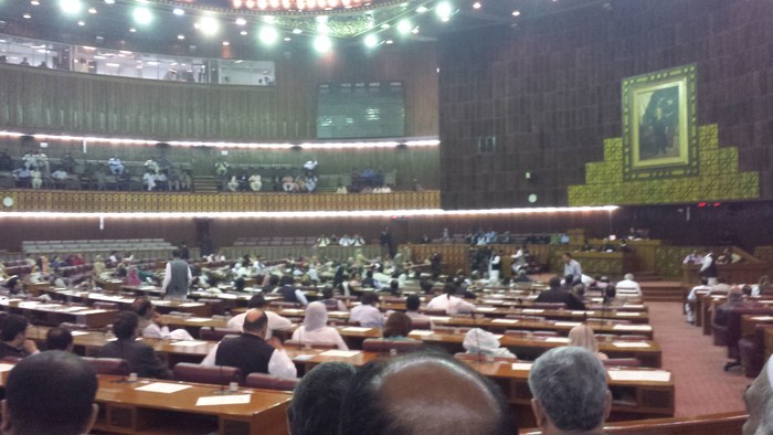 Inside the National Assembly chamber at Parliament House in Islamabad during a parliamentary session, where both houses approved the emergency proclamation for Khyber Pakhtunkhwa