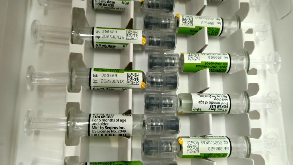 Influenza vaccine syringes, shown in a file photograph.